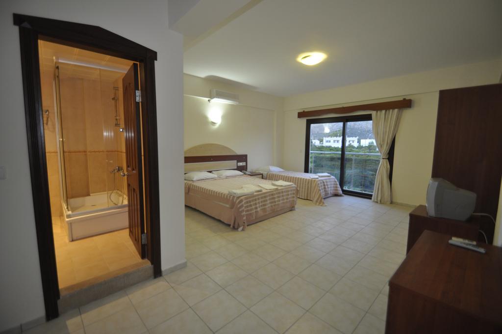 Ado Beach Hotel Тургутрейс Номер фото