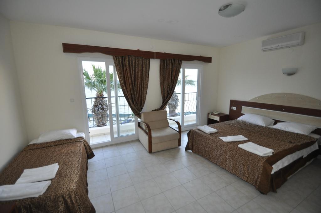 Ado Beach Hotel Тургутрейс Номер фото